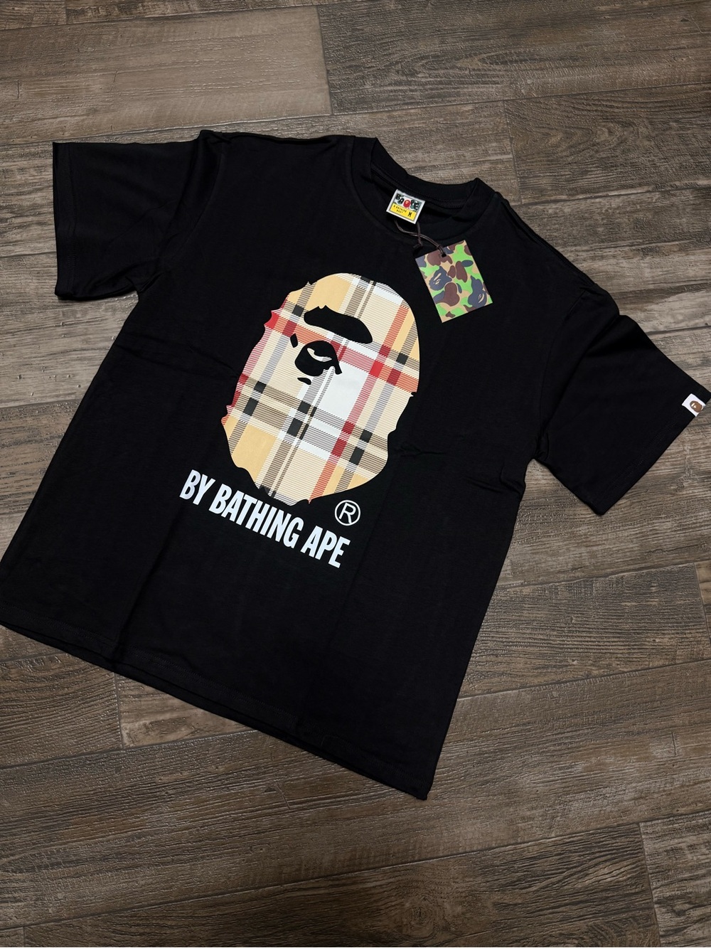 Bape Black Tee with Beige Plaid Ape Head Graphic